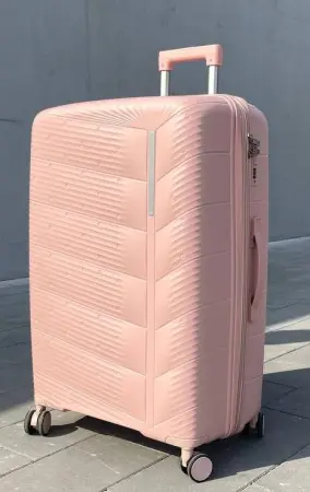 Чемодан Freedom NW персиковый S маленький с расширением