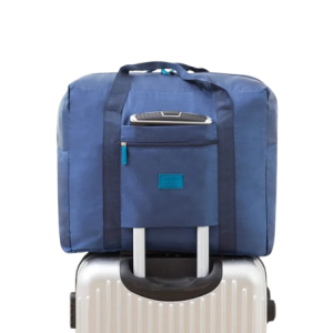 Дорожная сумка складная синяя на чемодане