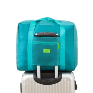 Дорожная сумка складная бирюзовая на чемодане